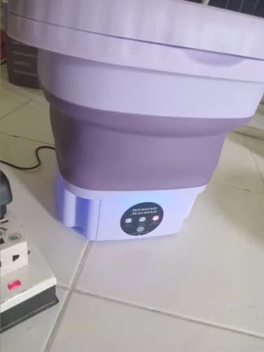 Recensione cliente di Marco con foto della lavatrice portatile